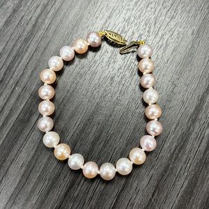 Multicolor freshwater pearl bracelet with 14k yellow gold fish hook clasp